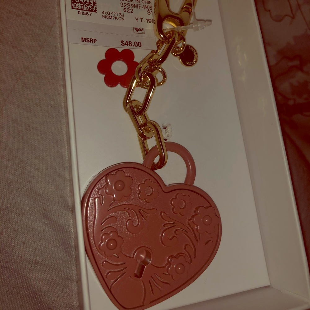 Michael Kors heart locket bag hardware